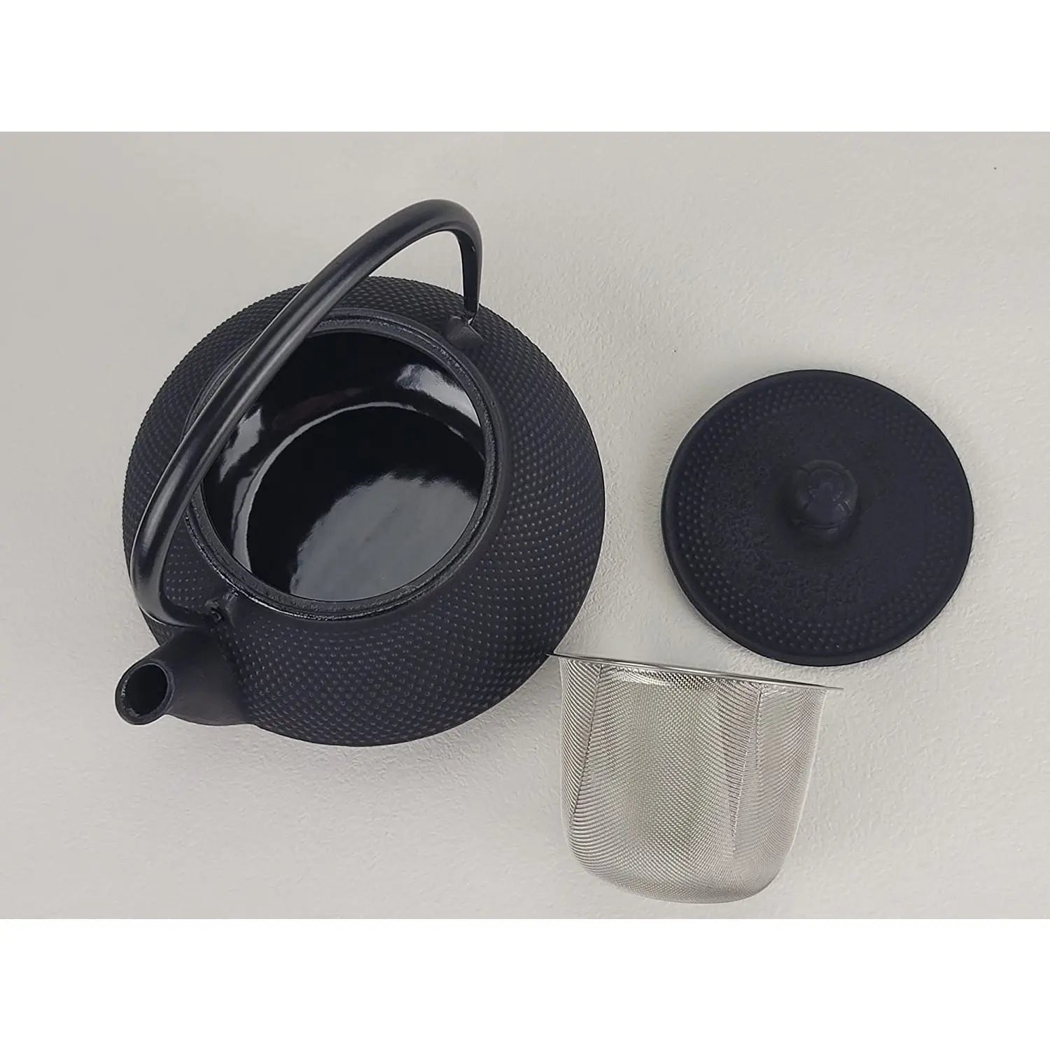 https://www.globalkitchenjapan.com/cdn/shop/files/IwachuNambuCastIronTetsukyusuTeapotArare12001_3.webp?v=1686096906