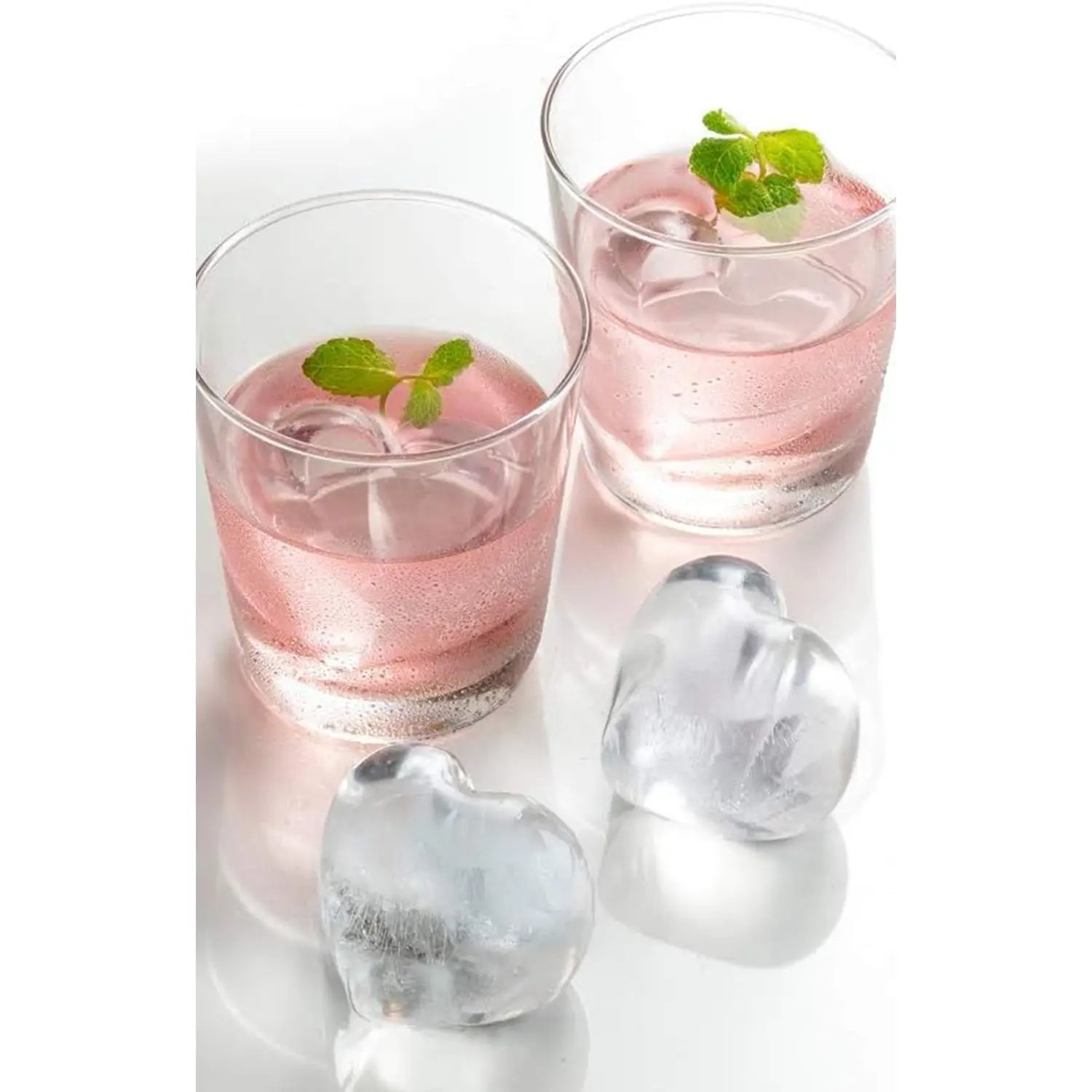 https://www.globalkitchenjapan.com/cdn/shop/files/SkaterSiliconeIceTrayHeartPink_2_1600x.webp?v=1688103309